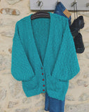 Bouclé turquoise vest