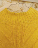 Zonnige gele trui