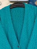 Bouclé turquoise vest