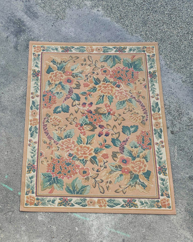 Zalm kleurig floral tapijt